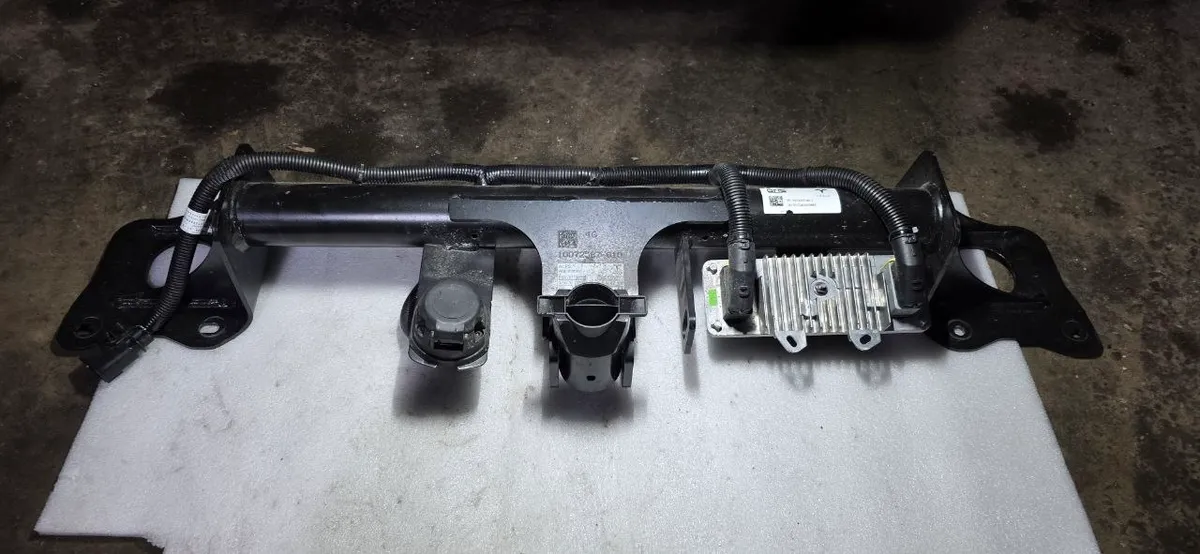 OEM Tesla tow hitch kit for Model Y: crossmember, coupling receiver, trailer module and wiring