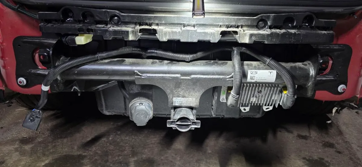 OEM tow hitch crossmember installed on the Model Y Juniper
