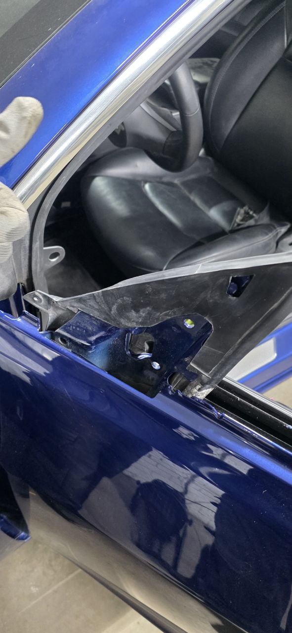 Back of mirror showing three 10mm mounting bolts