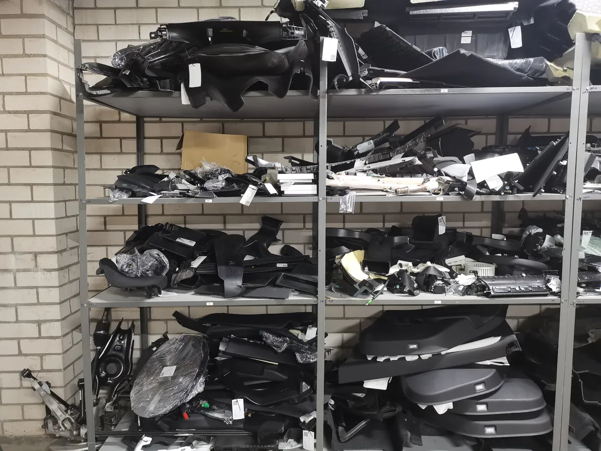 Tesla OEM parts inventory at RR Car Parts warehouse